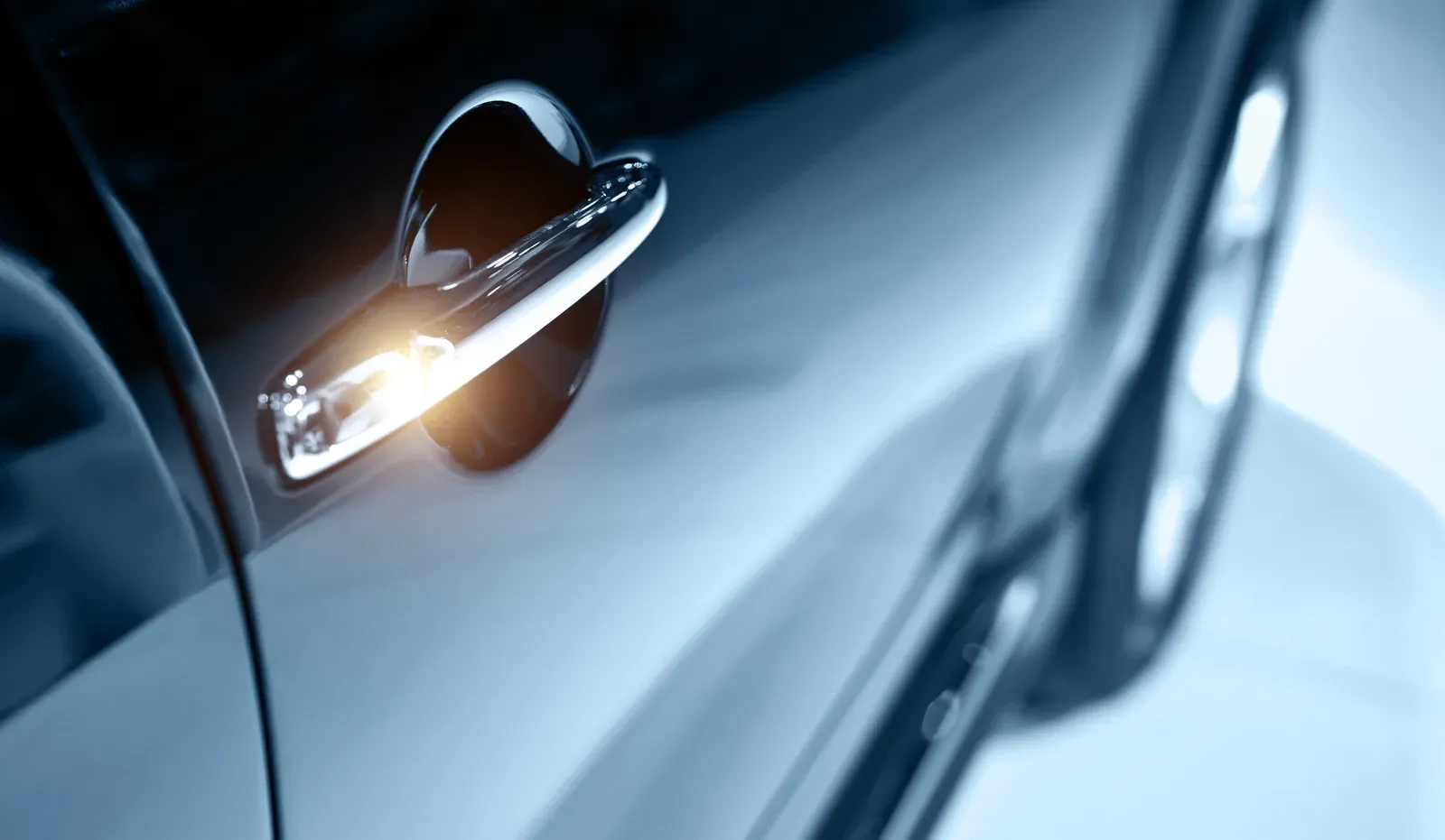 Close view of finished clearcoat gloss on a repaired Volkswagen panel at Prime Auto Body